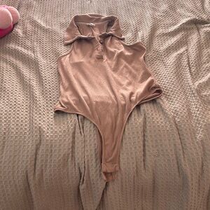 tan body suit small